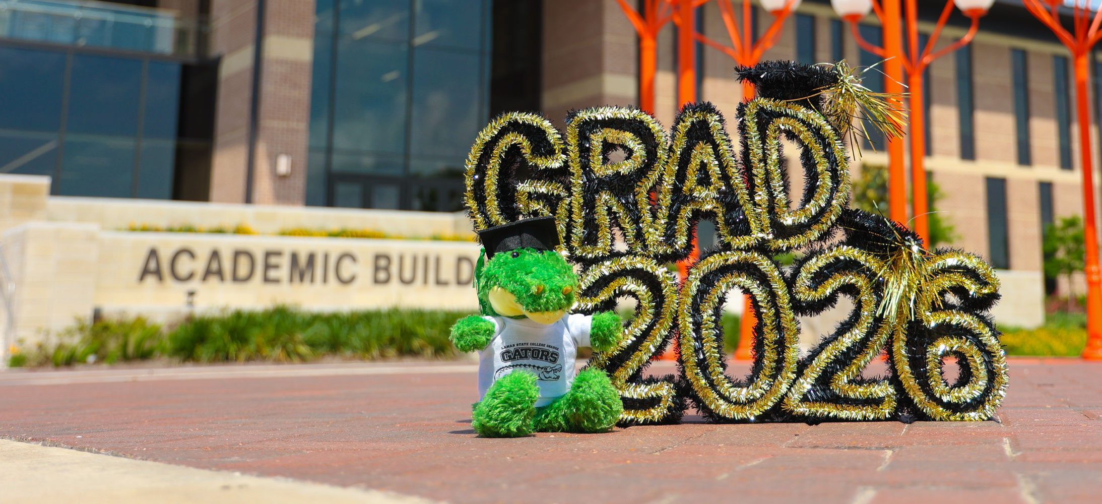 Stuffed Gator with Grad 2026 Sign