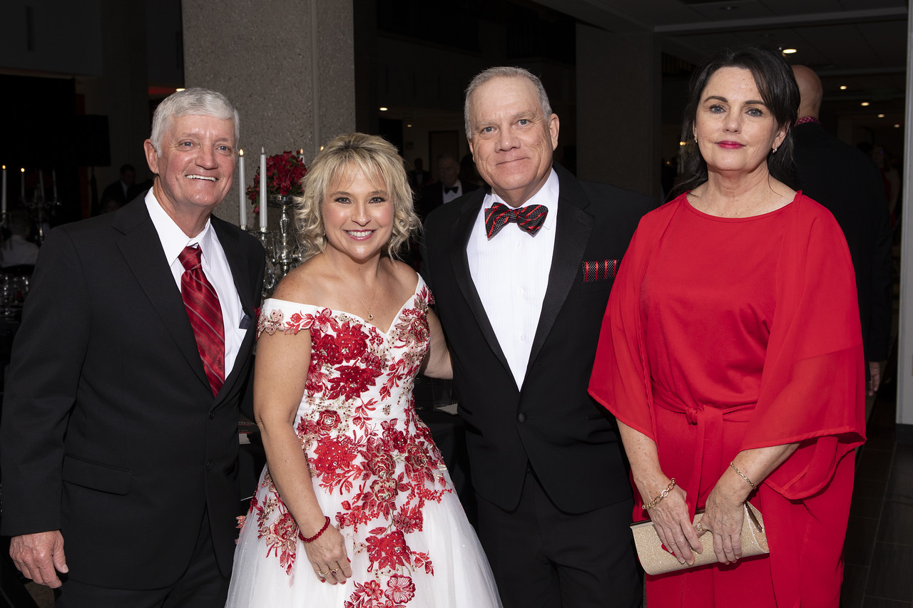 Dr. Johnson and his wife with Mandee Tucker and her husband