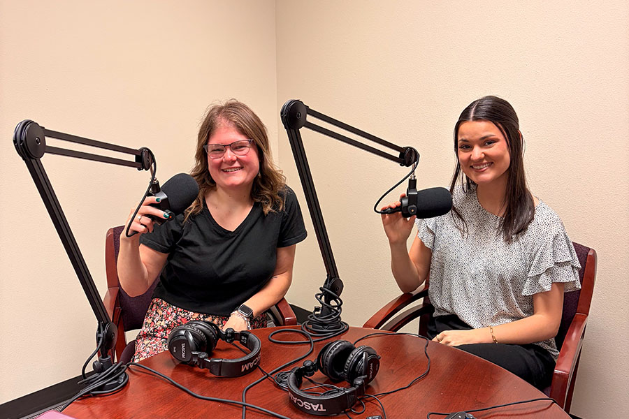 bayleigh smith and elaina forester recording a podcast