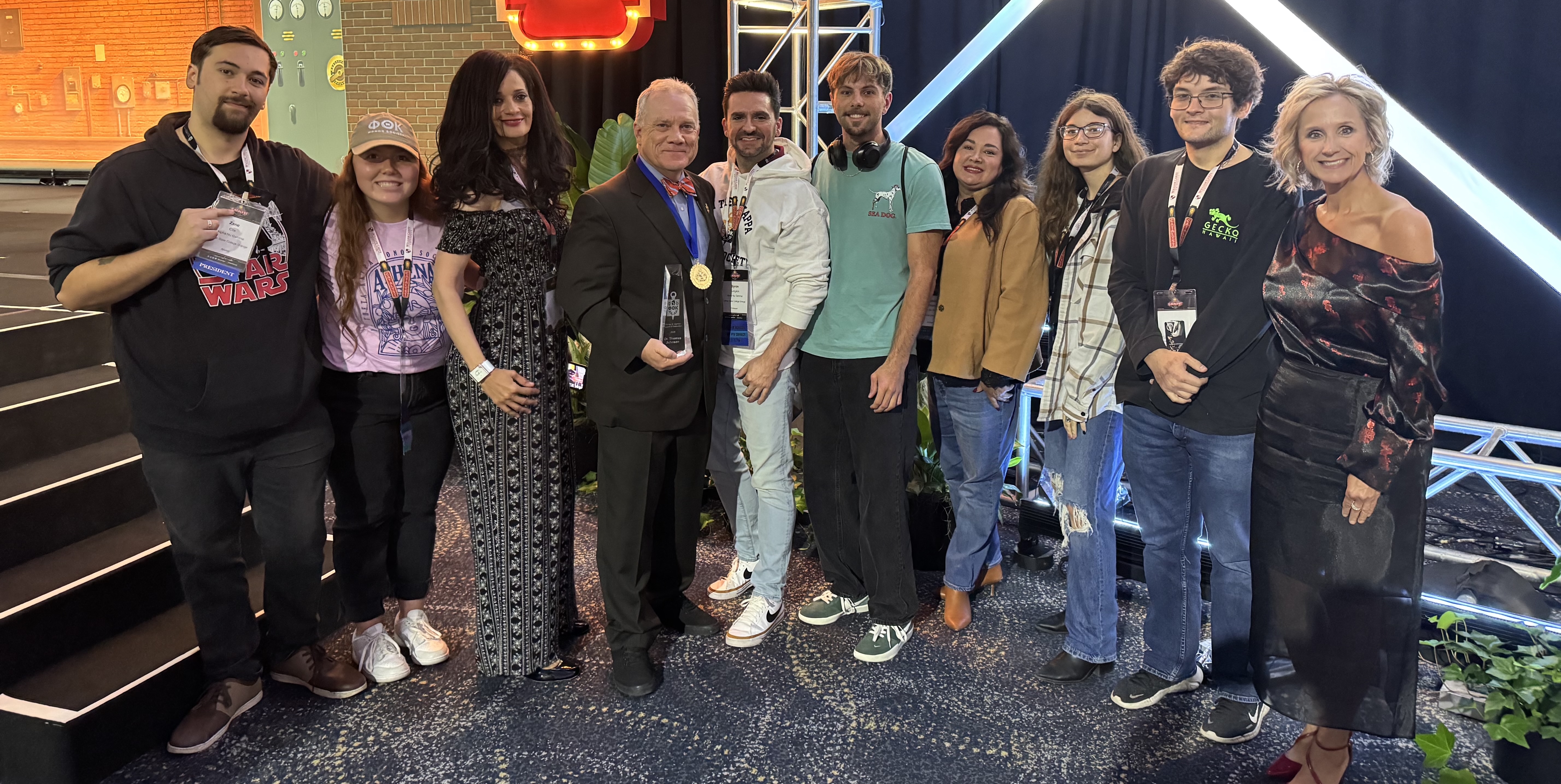 Dr. Johnson with students and administrators at the PTK Event