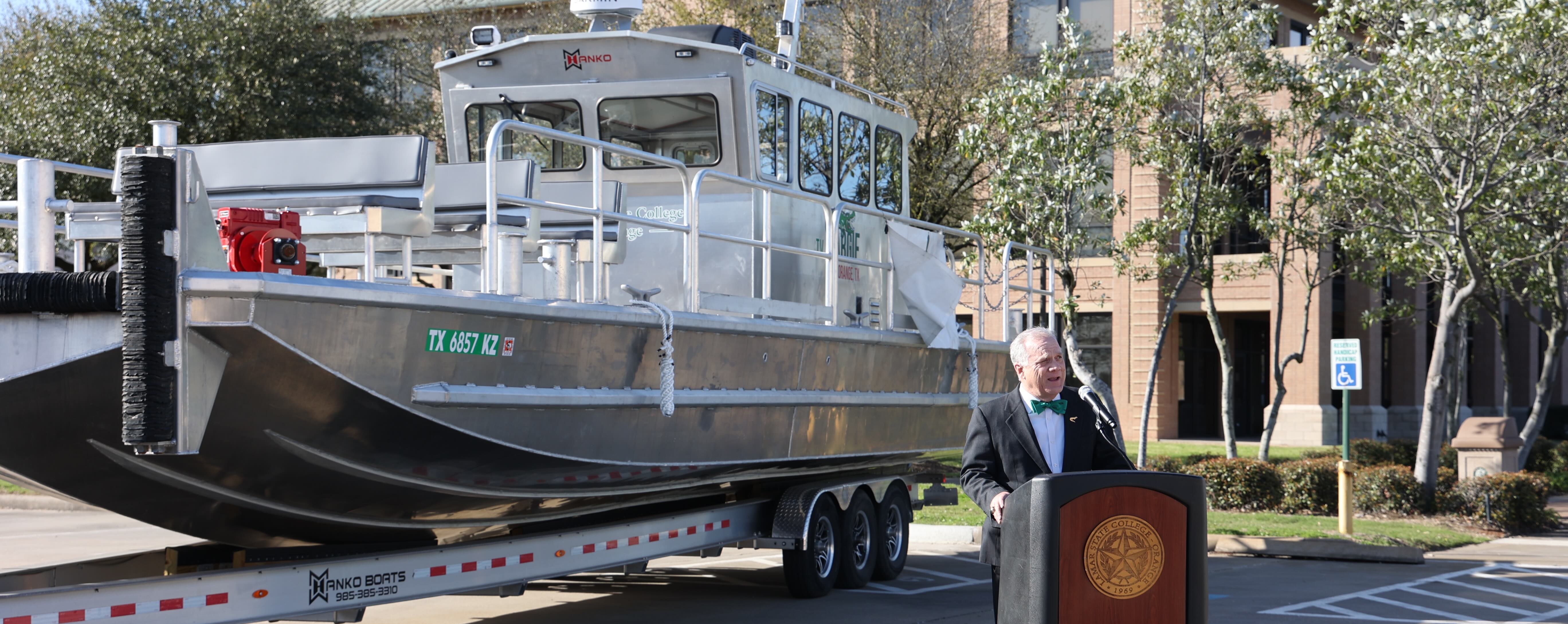 Dr. Johnson speaking at the Christening Ceremony