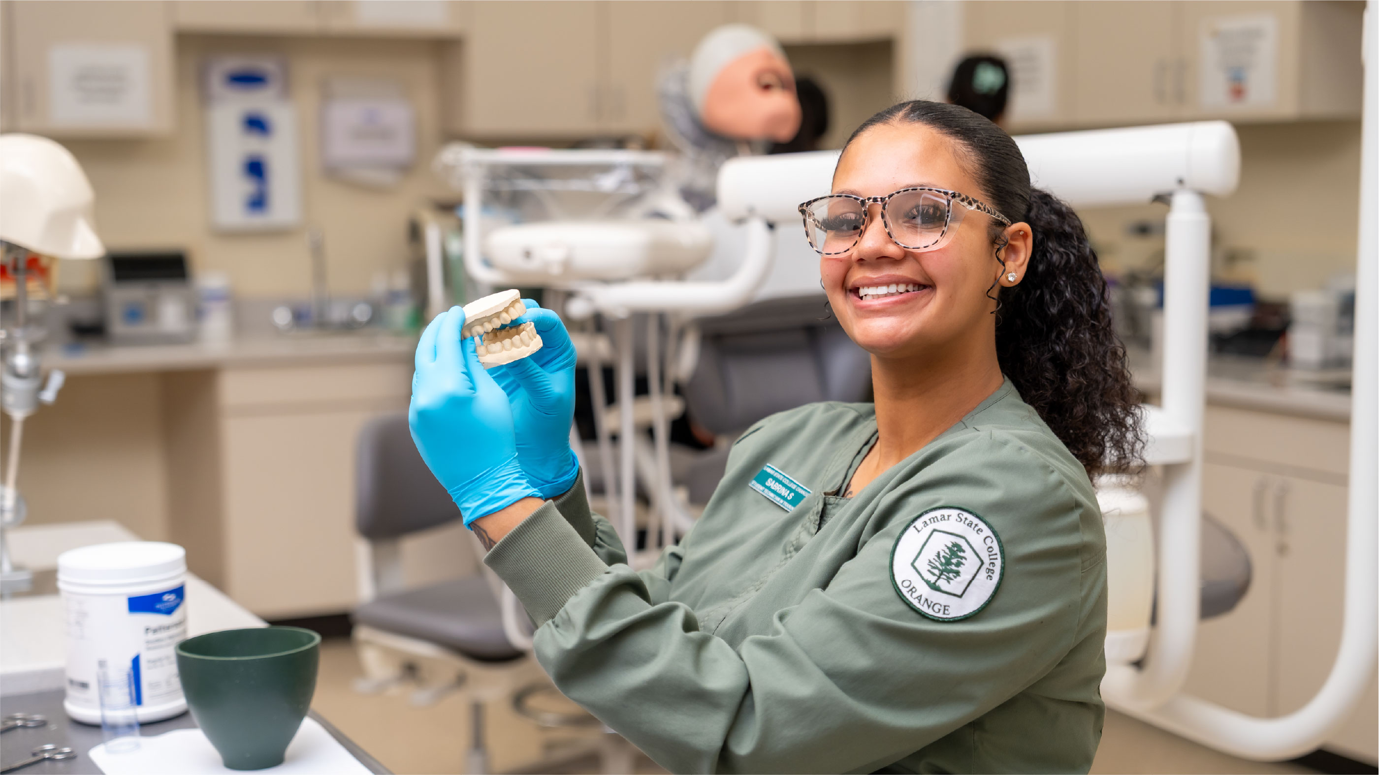 Dental Assiting Stuent creating a mold